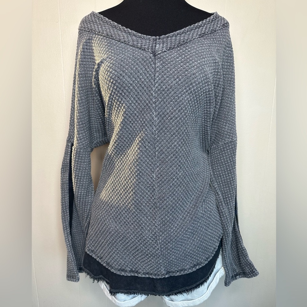 Gray sweater size medium.